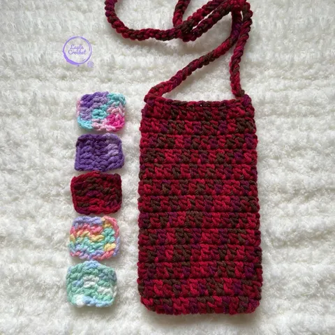Túi đựng điện thoại màu loang, khoá cài, kích thước: 17x10cm